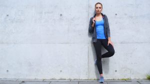 Young Fit Woman Standing |The Dos and Don'ts of Athleisure Wear | Featured