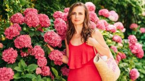 woman wearing a red dress | Best Summer Dresses and Fashion Pieces For Women Over 40 | Featured