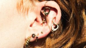 Ear with constellation piercing | Cute Constellation Piercing Ideas To Match Your Outfit | Featured