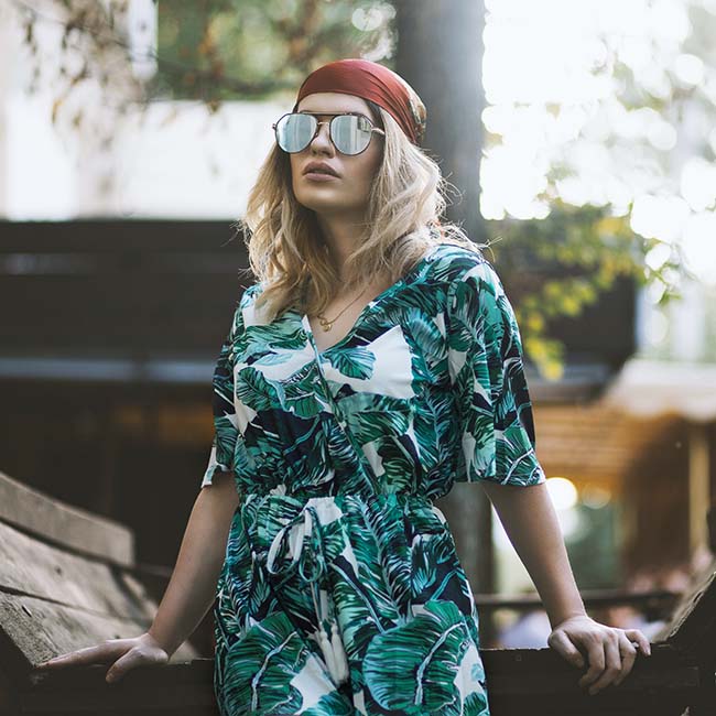 woman rocking the leafy print playsuit | Playsuits To Wear When It's Too Warm For Jumpsuits 