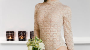 woman wearing lace bodysuit-bodysuit outfits-canva | 13 Bodysuit Outfits The Cool Girls Are Wearing Right Now | Featured