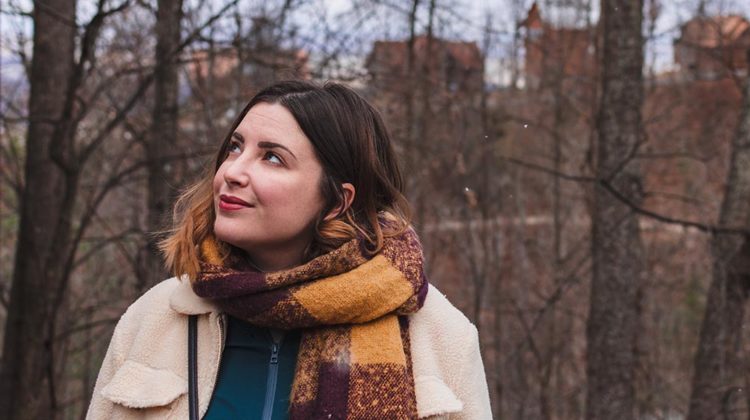 shallow focus photo of woman wearing brown scarf | Types of Scarves Every Stylish Woman Should Know | Featured