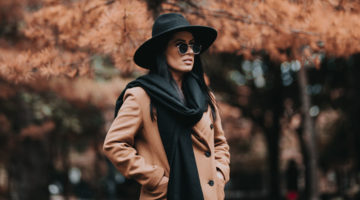 woman in brown coat standing near brown leaf tree during daytime | Cute Casual Fall Outfits For The Colder Weather | Featured | fall season